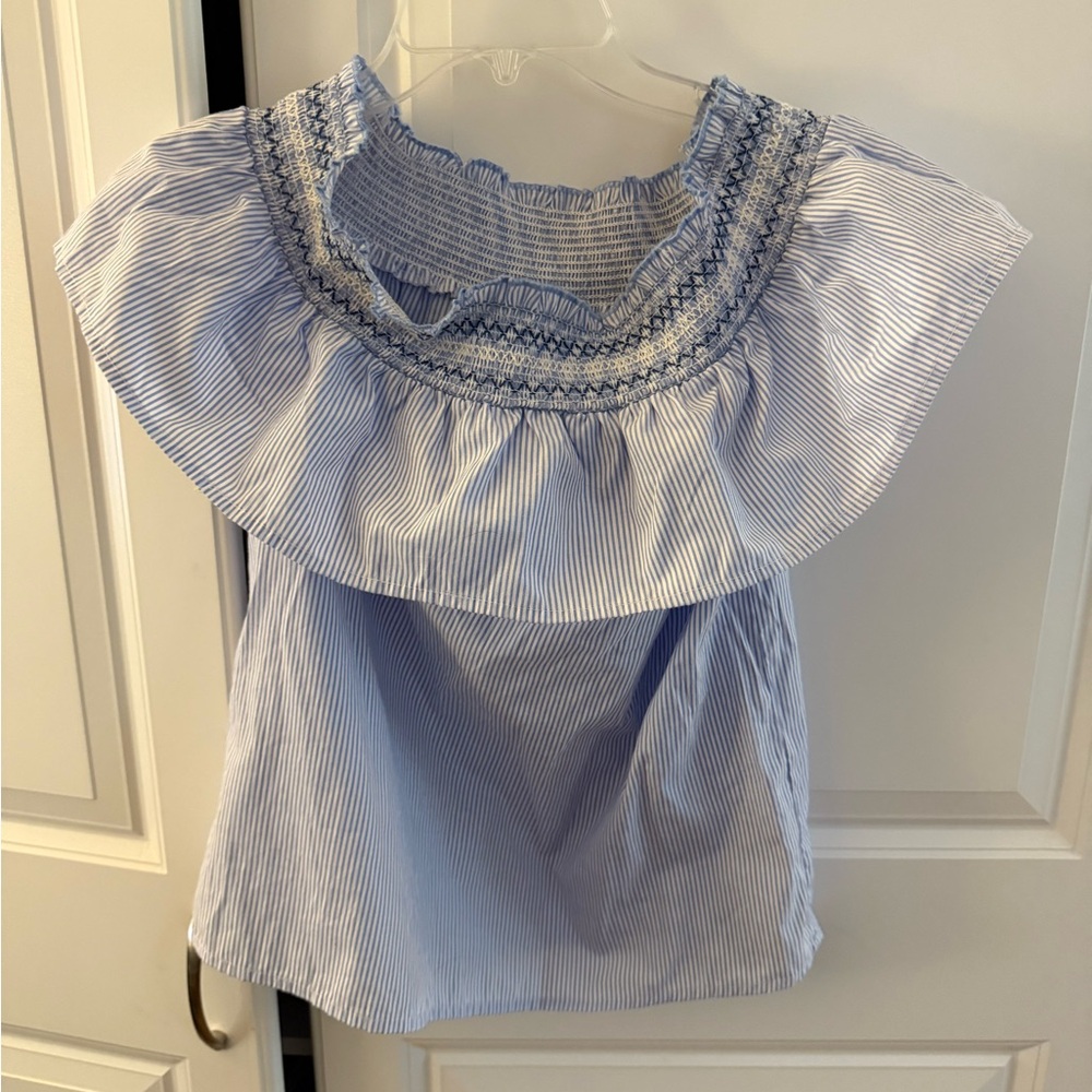 Blue and white striped smocked top with ruffle details